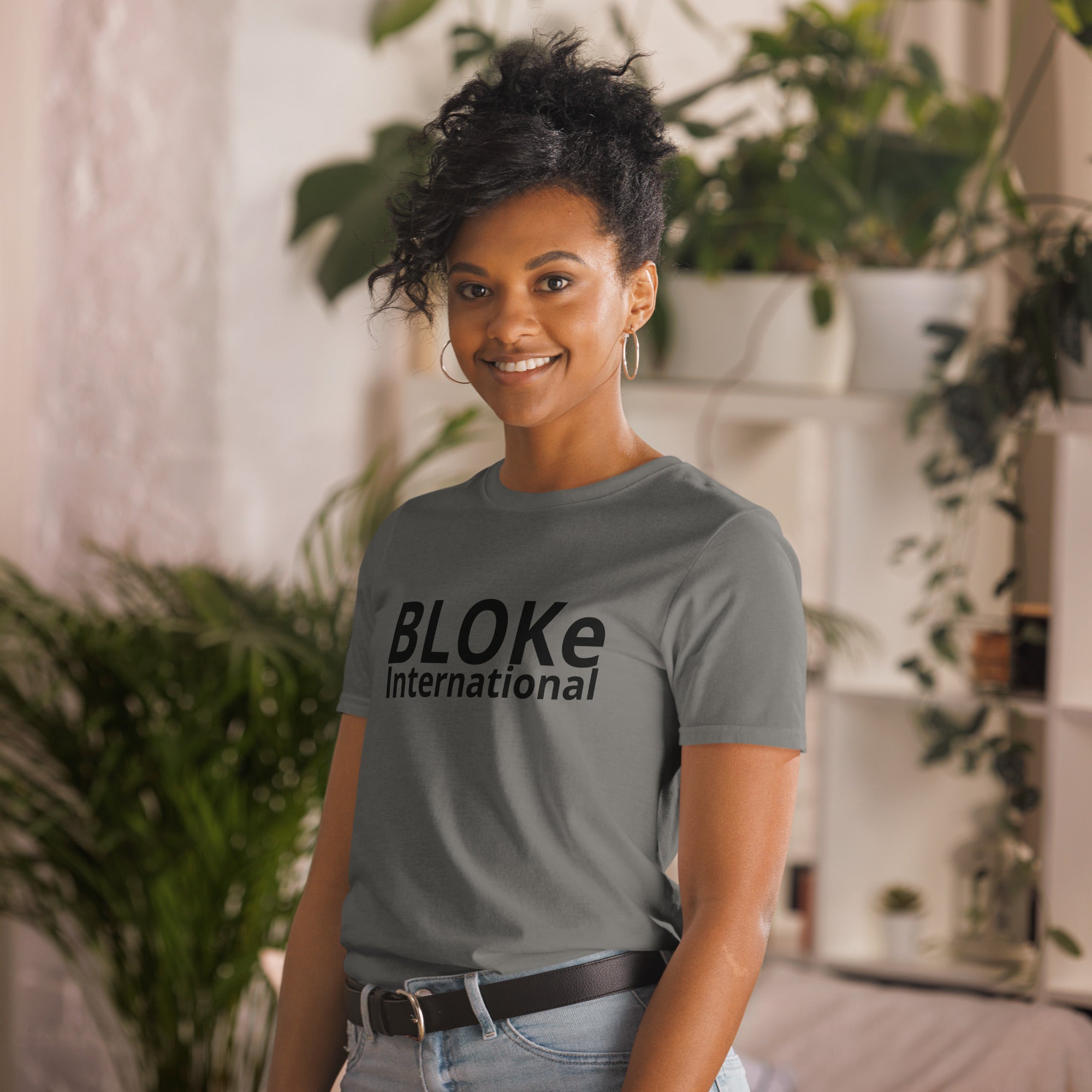 Woman smiling in Club Bloke International Christian T-shirt